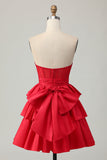 Robe de cocktail verte trapèze bustier à volants et perles avec nœud