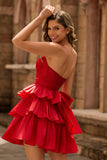 Robe de cocktail verte trapèze bustier à volants et perles avec nœud