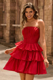 Robe de cocktail verte trapèze bustier à volants et perles avec nœud