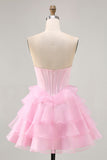 Robe de cocktail rose sans bretelles perlée à plusieurs niveaux