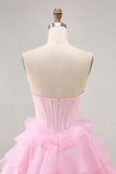 Robe de cocktail rose sans bretelles perlée à plusieurs niveaux