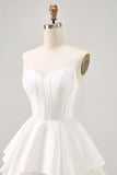 Corset bustier en satin blanc Une Robe de cocktail