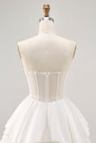 Corset bustier en satin blanc Une Robe de cocktail