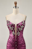 Robe de cocktail courte moulante à perles dorées