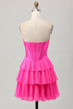 Robe de cocktail corset fuchsia sans bretelles à plusieurs niveaux