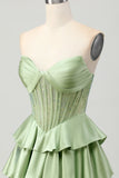 Robe de cocktail trapèze sans bretelles perlée vert foncé
