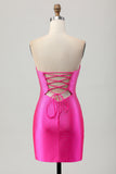 Robe de cocktail bustier découpée perlée fuchsia moulante