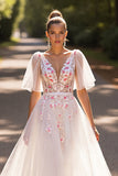 Robe de mariée demi-manches florales blanches une ligne