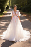 Robe de mariée demi-manches florales blanches une ligne