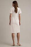 Robe de travail midi à revers crantés en satin ivoire avec ceinture