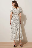 Robe de travail midi à pois blancs à manches courtes