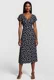 Robe de travail midi à pois noirs à col en V