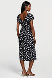 Robe de travail midi à pois noirs à col en V