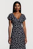 Robe de travail midi à pois noirs à col en V