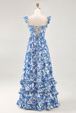 Robe d’invitée de mariage bleue imprimée à volants à épaules dénudées avec fente