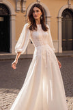 Robe de mariée à manches longues ivoire à manches longues
