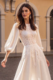 Robe de mariée à manches longues ivoire à manches longues