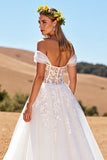Corset à épaules dénudées Ivoire Une Robe De Mariée En Tulle Ligne.