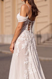 Corset à épaules dénudées Ivoire Une robe de mariée appliquée en ligne