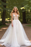 Robe de mariée ivoire à col en V avec appliques