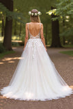 Robe de mariée ivoire à col en V avec appliques