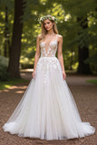 Robe de mariée ivoire à col en V avec appliques