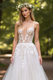 Robe de mariée ivoire à col en V avec appliques