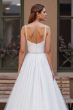 Robe de mariée à col rond en perles ivoire