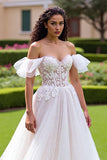 Robe de mariée à épaules dénudées ivoire une ligne appliquée