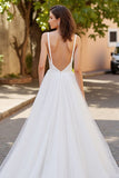 Robe de mariée longue en tulle ivoire à col en V