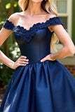 Robe courte corset marine avec appliques