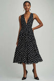 Robe en mousseline de soie à pois noirs et blancs