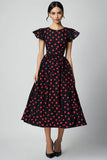 Une ligne Robe à pois rouges à volants