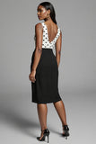 Robe de travail midi à pois ivoire et noir avec fente