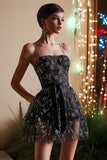 Robe de cocktail trapèze courte noire avec appliques
