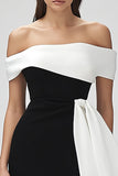Robe de cocktail courte moulante ivoire et noire à volants