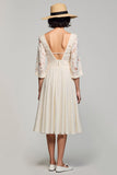 Robe midi à col carré ivoire avec demi-manches