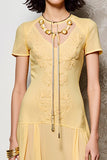 Mousseline de soie jaune Une ligne robe