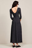 Robe à pois noirs avec fente