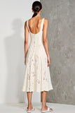 Robe midi blanche à lignes longues avec appliques