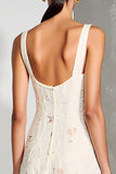 Robe midi blanche à lignes longues avec appliques