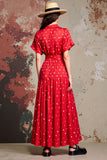 Robe à pois rouge à col polo