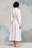 Robe blanche à pois à revers crantés
