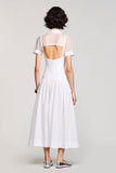 Robe d’invité de mariage blanche en ligne avec noeud
