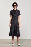 Robe noire à pois à col polo