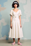 Robe d’invitée de mariée à volants ivoire