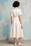 Robe d’invitée de mariée à volants ivoire