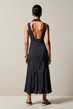 Robe longue d’invitée de mariage en mousseline de soie à pois noirs