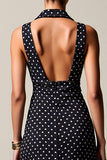 Robe longue d’invitée de mariage en mousseline de soie à pois noirs