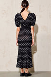 Robe longue à pois noirs à pois avec ceinture